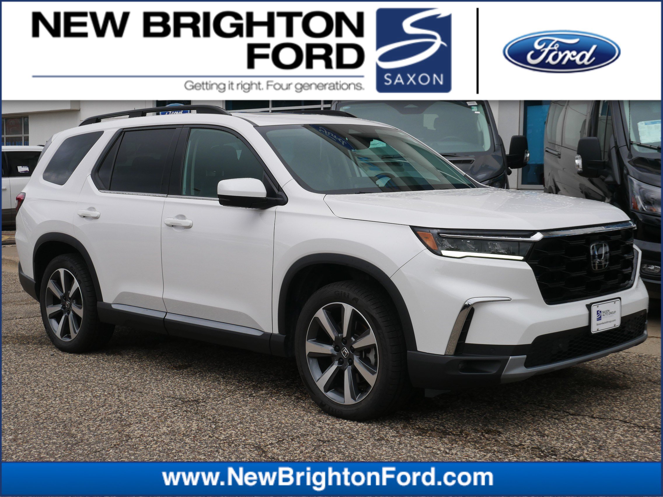 Used 2023 Honda Pilot Touring with VIN 5FNYG1H76PB025227 for sale in New Brighton, Minnesota