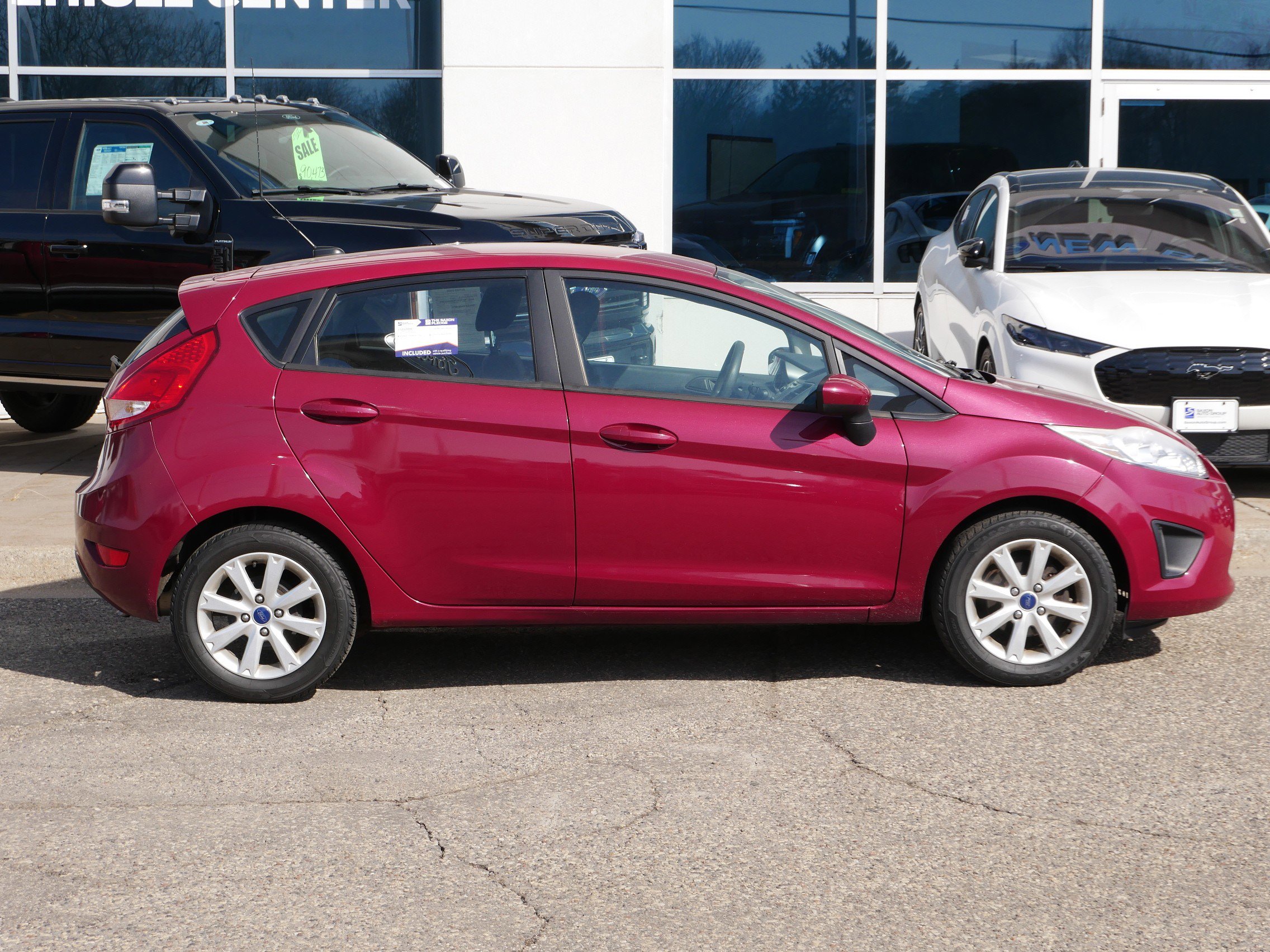 Used 2011 Ford Fiesta SE with VIN 3FADP4EJ1BM233803 for sale in New Brighton, Minnesota