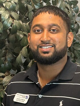 Staff member Jason Oomrow from ID_43e1d5d3a75d