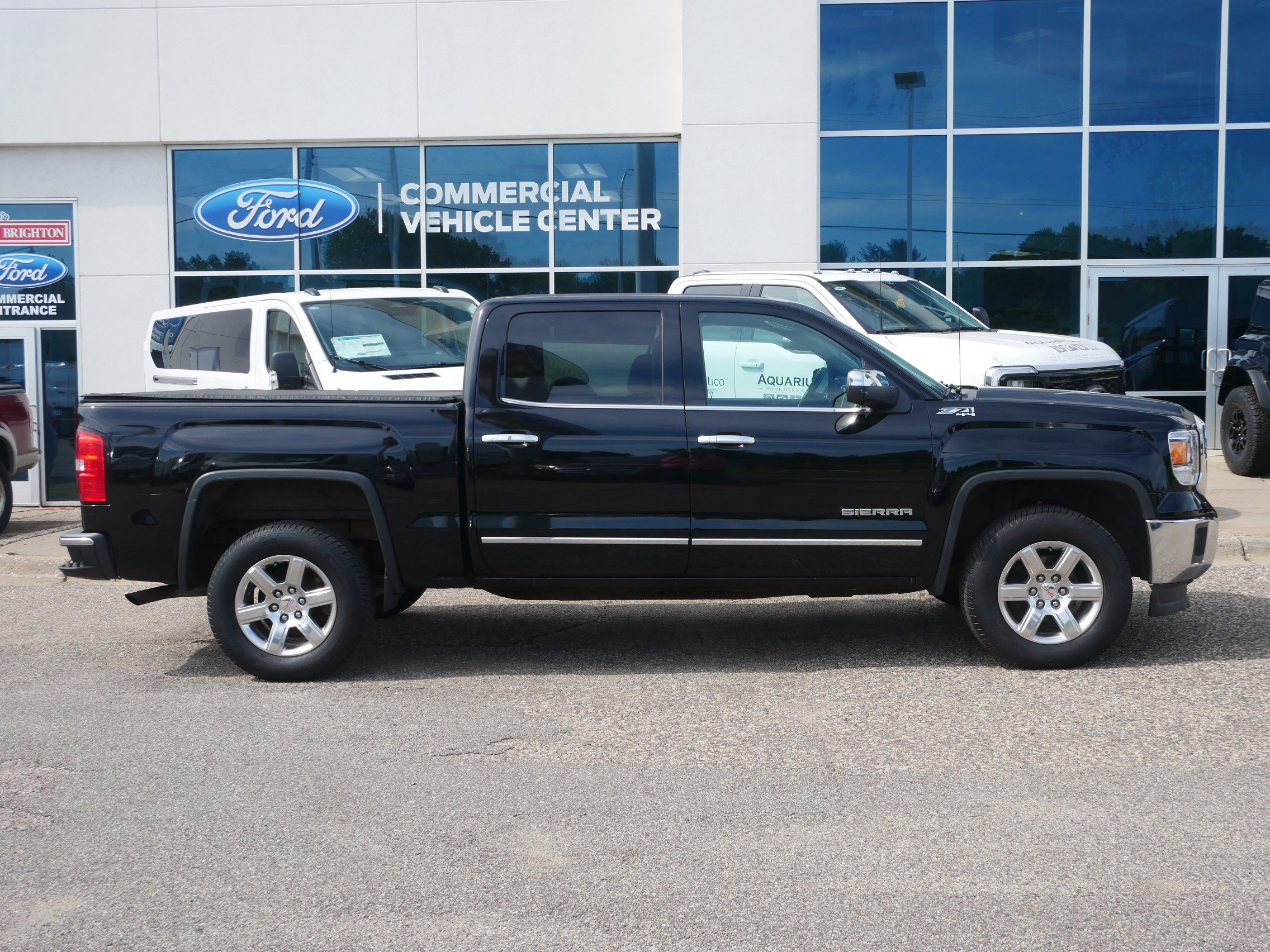 Used 2014 GMC Sierra 1500 SLT with VIN 3GTU2VEC4EG446084 for sale in New Brighton, Minnesota