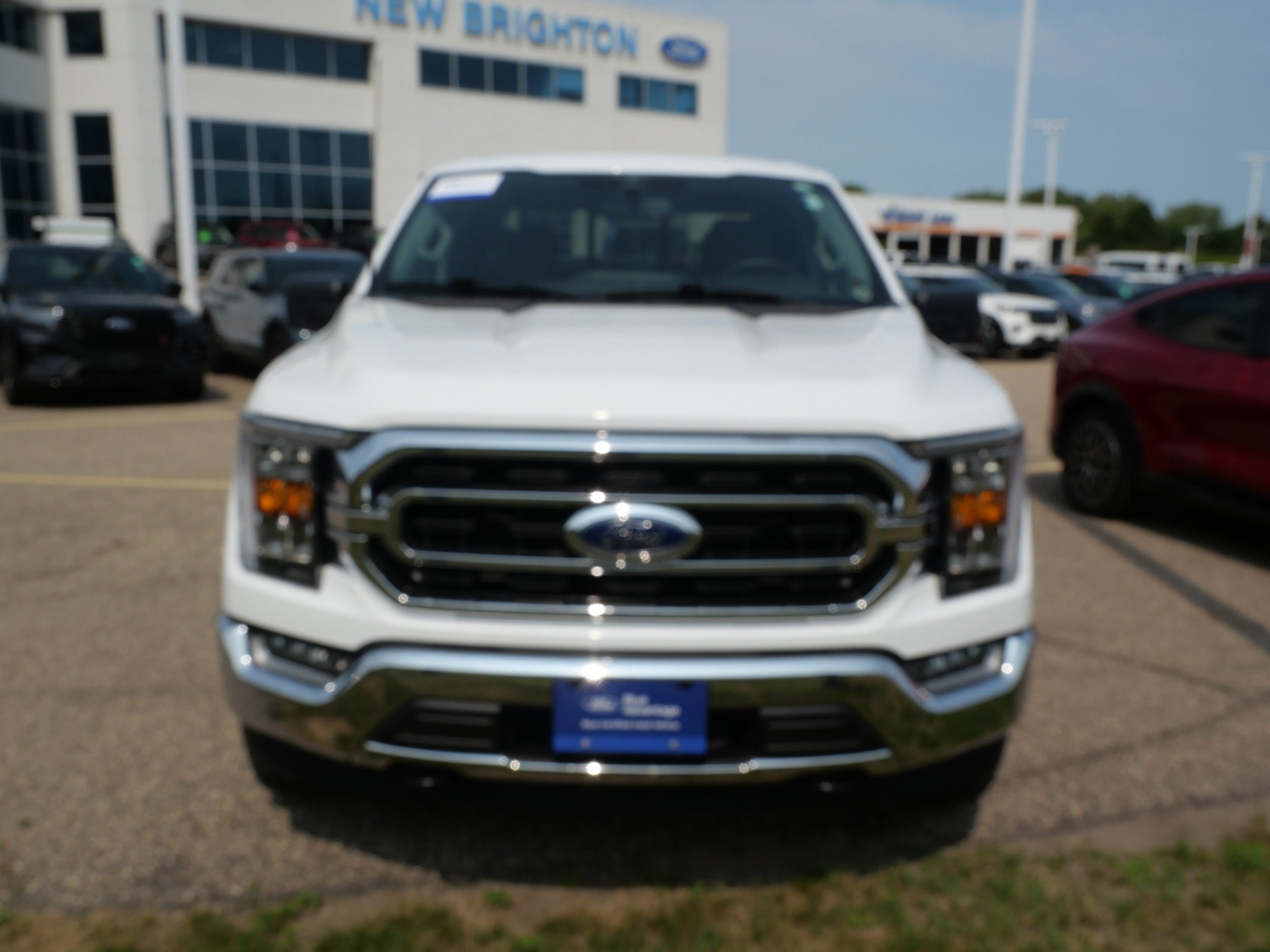 Used 2023 Ford F-150 XLT with VIN 1FTFW1E87PFB64236 for sale in New Brighton, Minnesota