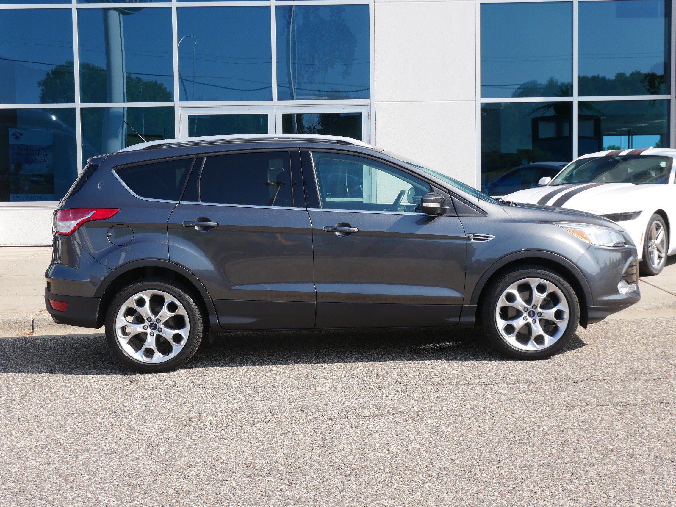 Used 2016 Ford Escape Titanium with VIN 1FMCU9J96GUA45087 for sale in New Brighton, MN