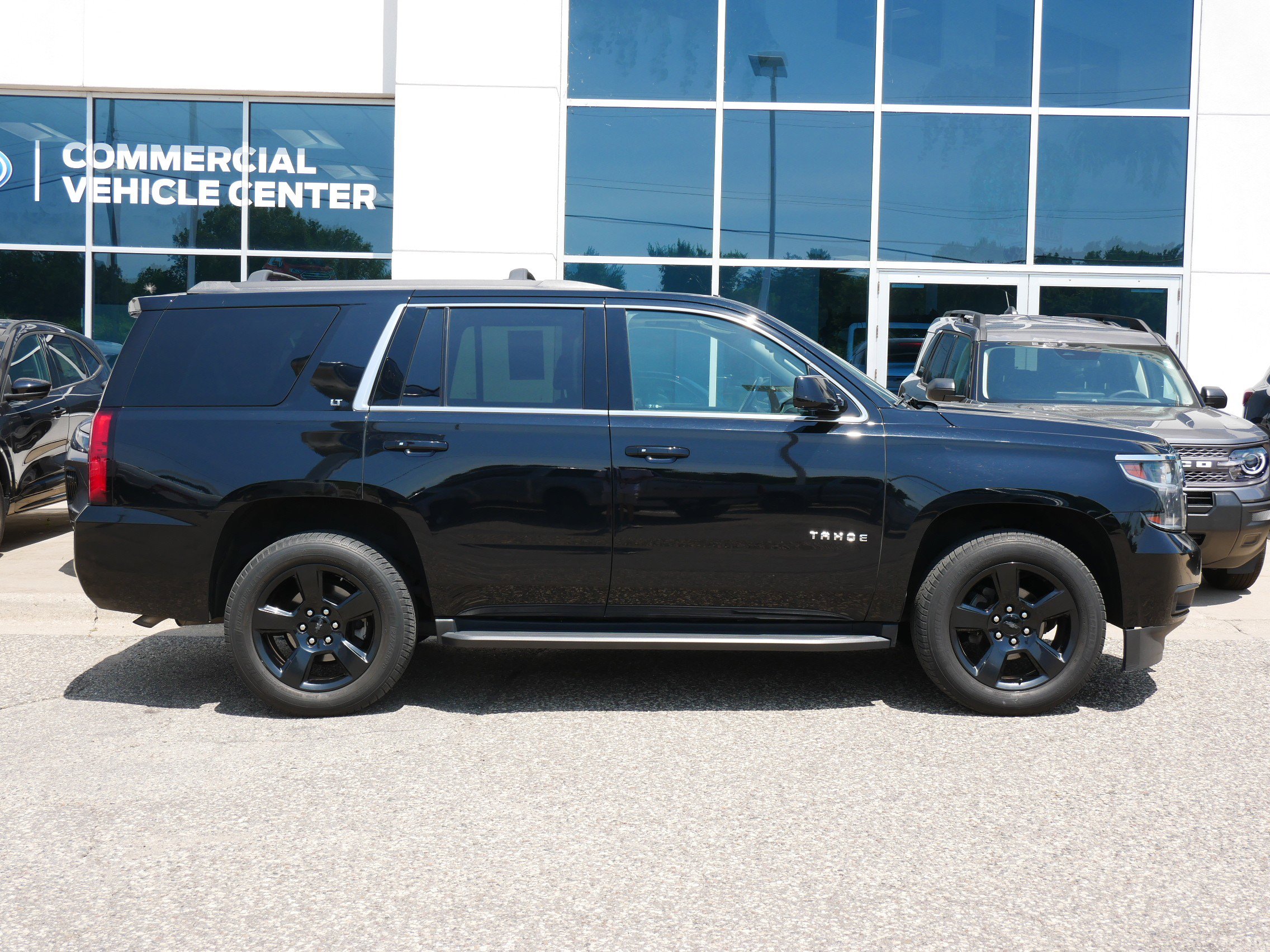 Used 2018 Chevrolet Tahoe LT with VIN 1GNSKBKC4JR145634 for sale in New Brighton, Minnesota