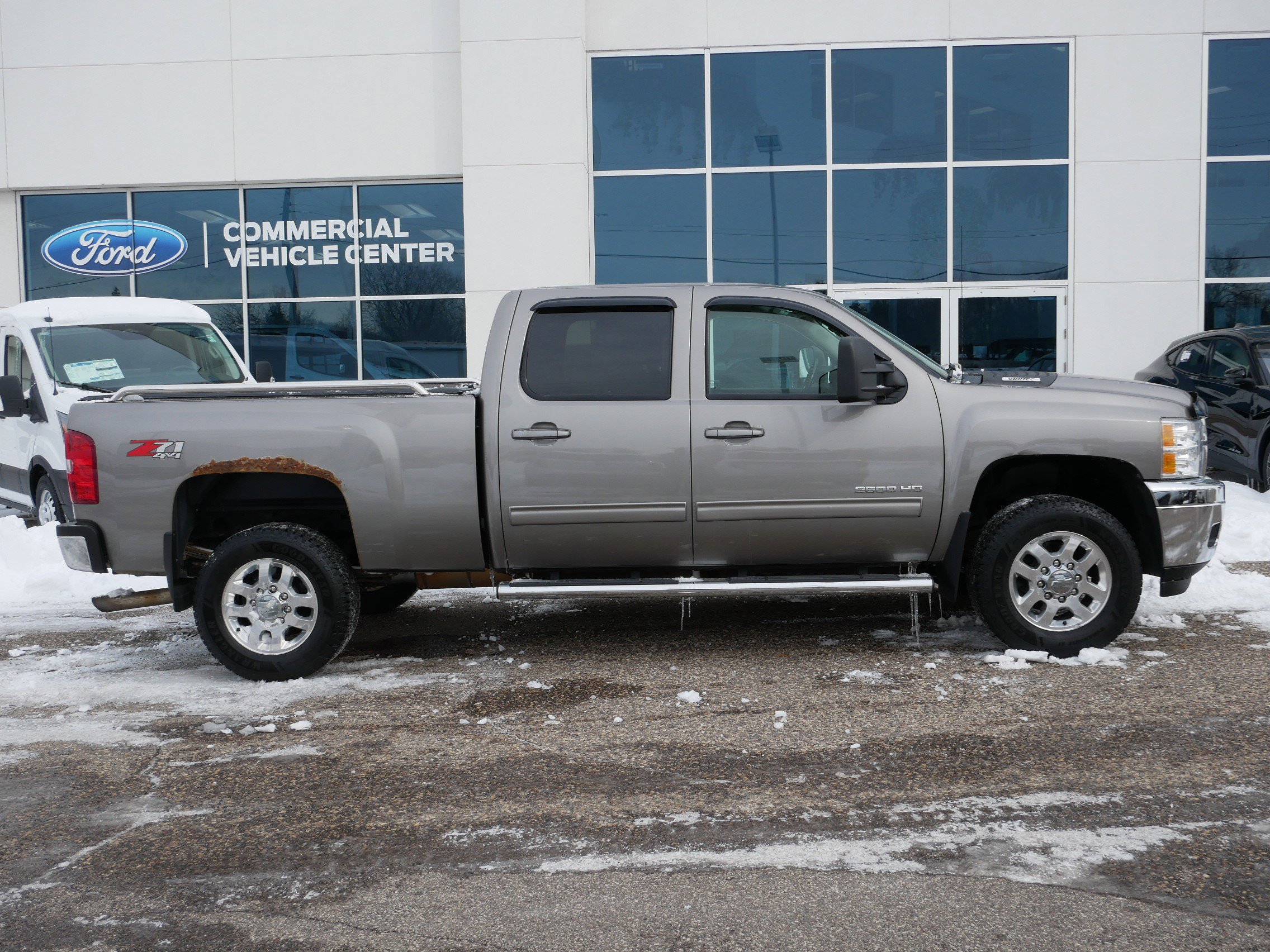 Used 2013 Chevrolet Silverado 2500HD LTZ with VIN 1GC1KYCG9DF241032 for sale in New Brighton, Minnesota