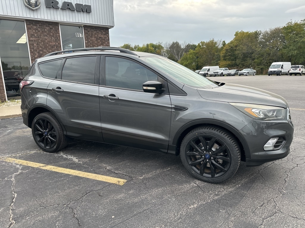 Used 2017 Ford Escape Titanium with VIN 1FMCU9J93HUD60558 for sale in Kansas City