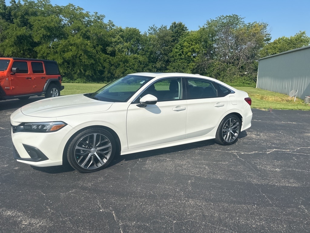 Used 2024 Honda Civic Touring with VIN 2HGFE1F96RH320621 for sale in Kansas City