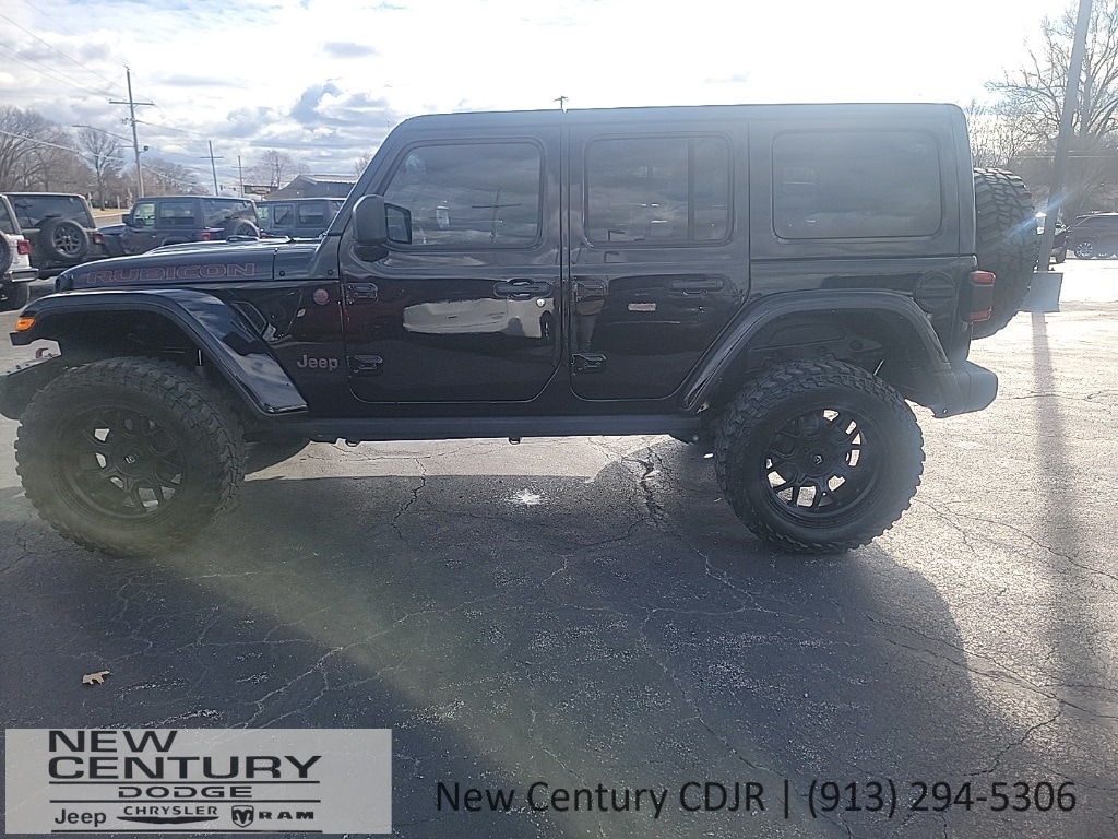 Used 2023 Jeep Wrangler 4-Door Rubicon with VIN 1C4HJXFN4PW623592 for sale in Kansas City