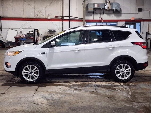 Used 2018 Ford Escape SE with VIN 1FMCU9GD6JUA04929 for sale in Clinton, MI