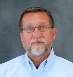 Staff member Tim Mimm from ID_43bad138e952