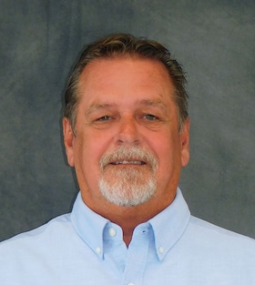 Staff member Kevin Davis from ID_43bad138e952