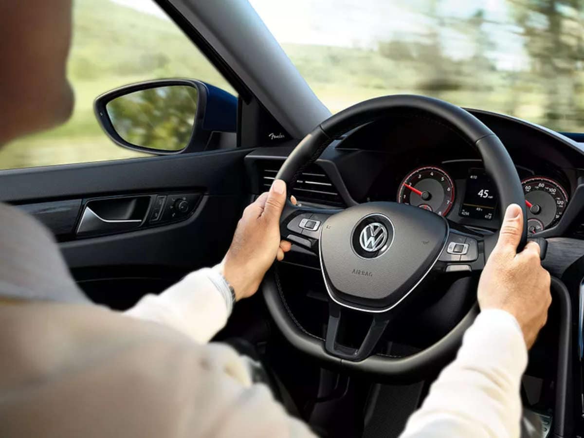 2021 Volkswagen Passat - Leather-wrapped, multi-function steering wheel with paddle shifters.
