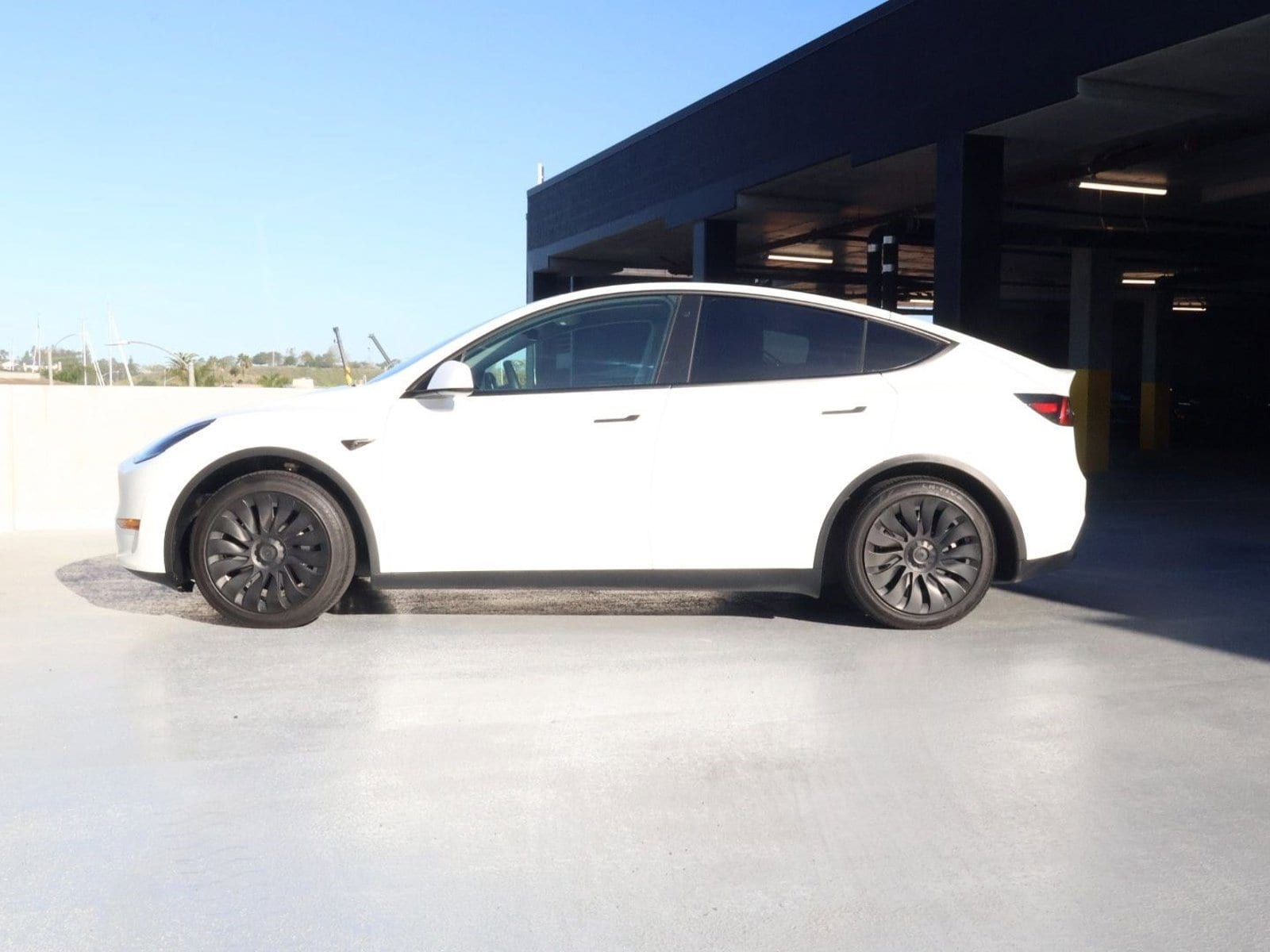 Used 2022 Tesla Model Y Long Range with VIN 7SAYGAEE0NF349714 for sale in Newport Beach, CA