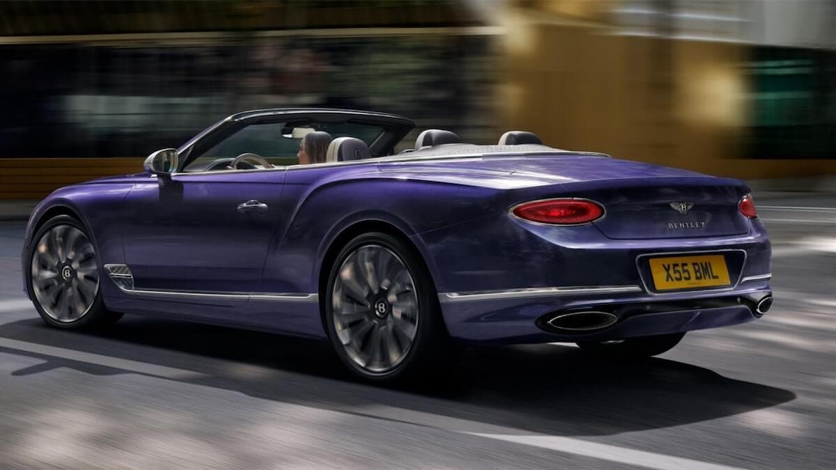 Bentley Continental GT Convertible driving down the road