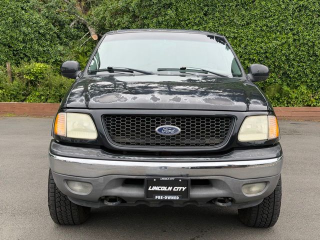 Used 2002 Ford F-150 Lariat with VIN 2FTRX18L72CA23746 for sale in Newport, OR