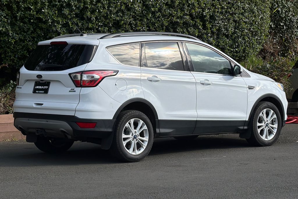 Used 2018 Ford Escape SE with VIN 1FMCU9GD6JUC91124 for sale in Newport, OR