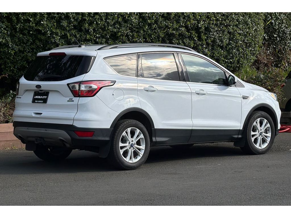 Used 2018 Ford Escape SE with VIN 1FMCU9GD6JUC91124 for sale in Newport, OR