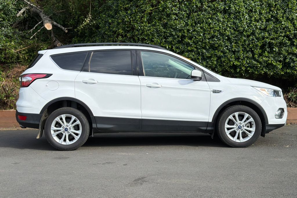 Used 2018 Ford Escape SE with VIN 1FMCU9GD6JUC91124 for sale in Newport, OR