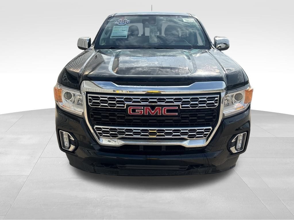 Used 2021 GMC Canyon Denali with VIN 1GTG6EENXM1291945 for sale in Coon Rapids, IA