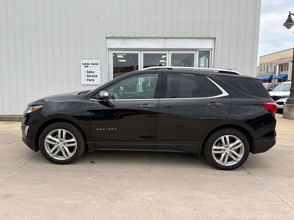 Used 2021 Chevrolet Equinox Premier with VIN 2GNAXXEV4M6136469 for sale in Pocahontas, IA
