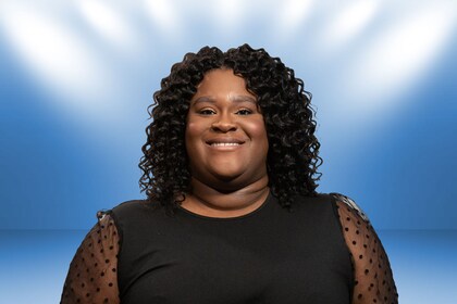 Staff member Theadorah Booker from ID_4f8df7