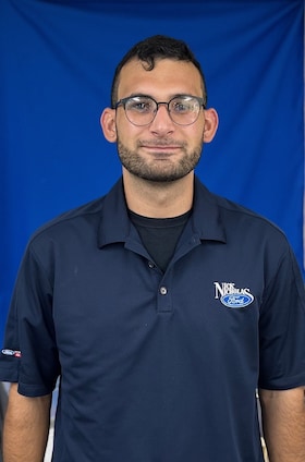Staff member Evan Torres from 6094cbeff85b