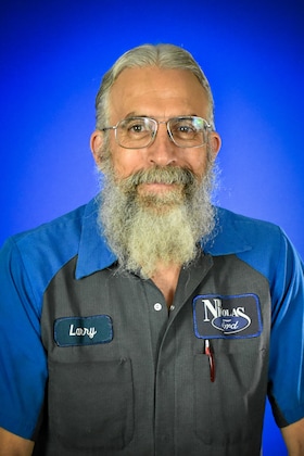 Staff member Larry Scull from 286539a215e9