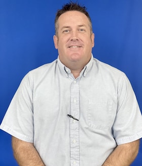 Staff member Travis Wells from 286539a215e9