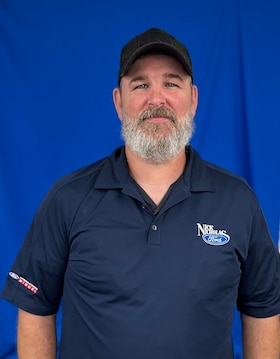 Staff member Chris Powell from 286539a215e9