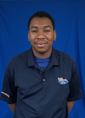 Staff member Elijah Martinez from 286539a215e9