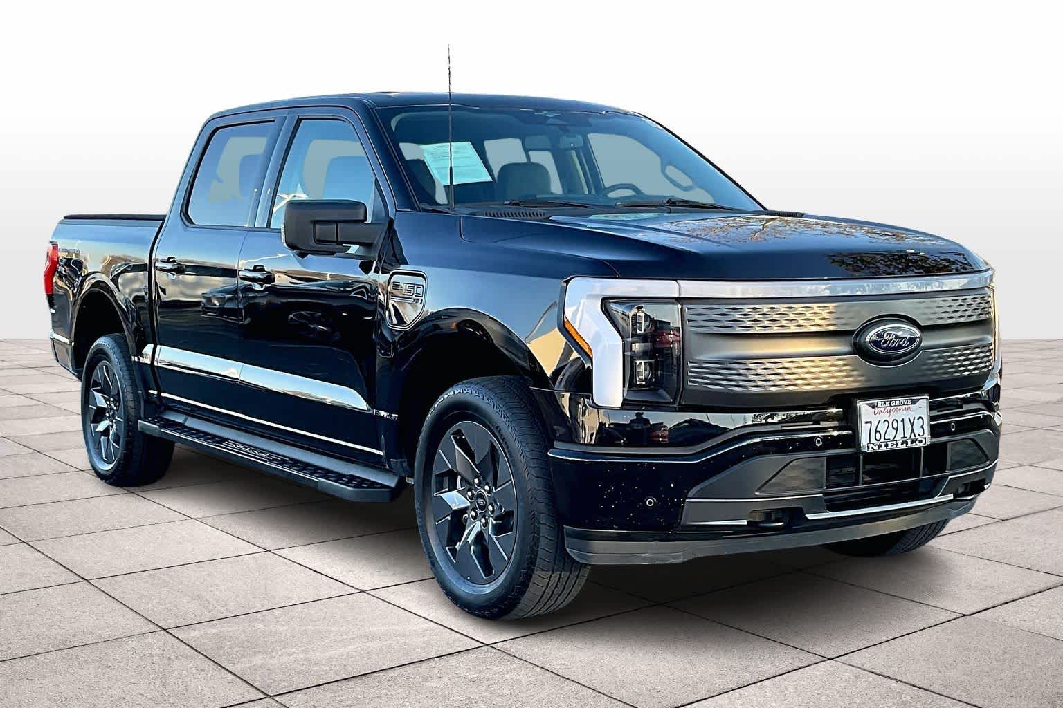 Used 2023 Ford F-150 Lightning XLT with VIN 1FTVW1EV7PWG51373 for sale in Elk Grove, CA