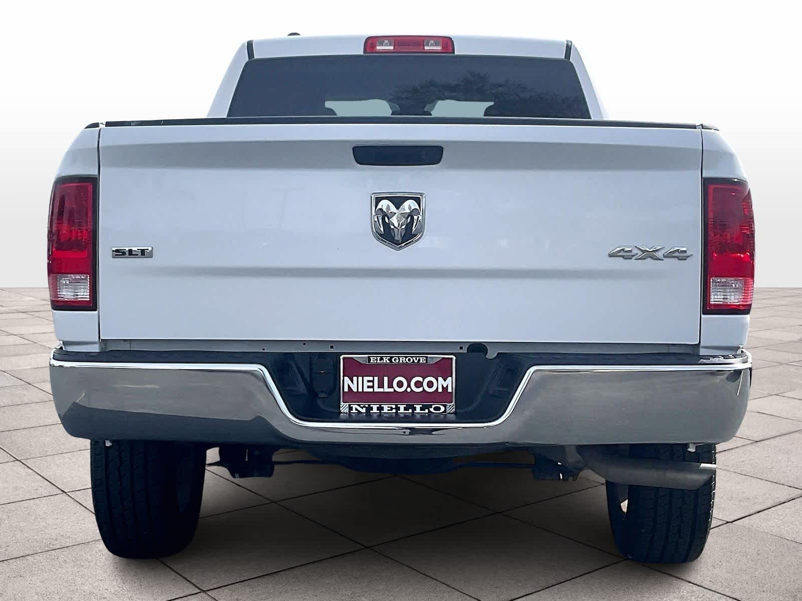 2024 Ram 1500 Classic SLT 4x4 Quad Cab 64 Box photo 4