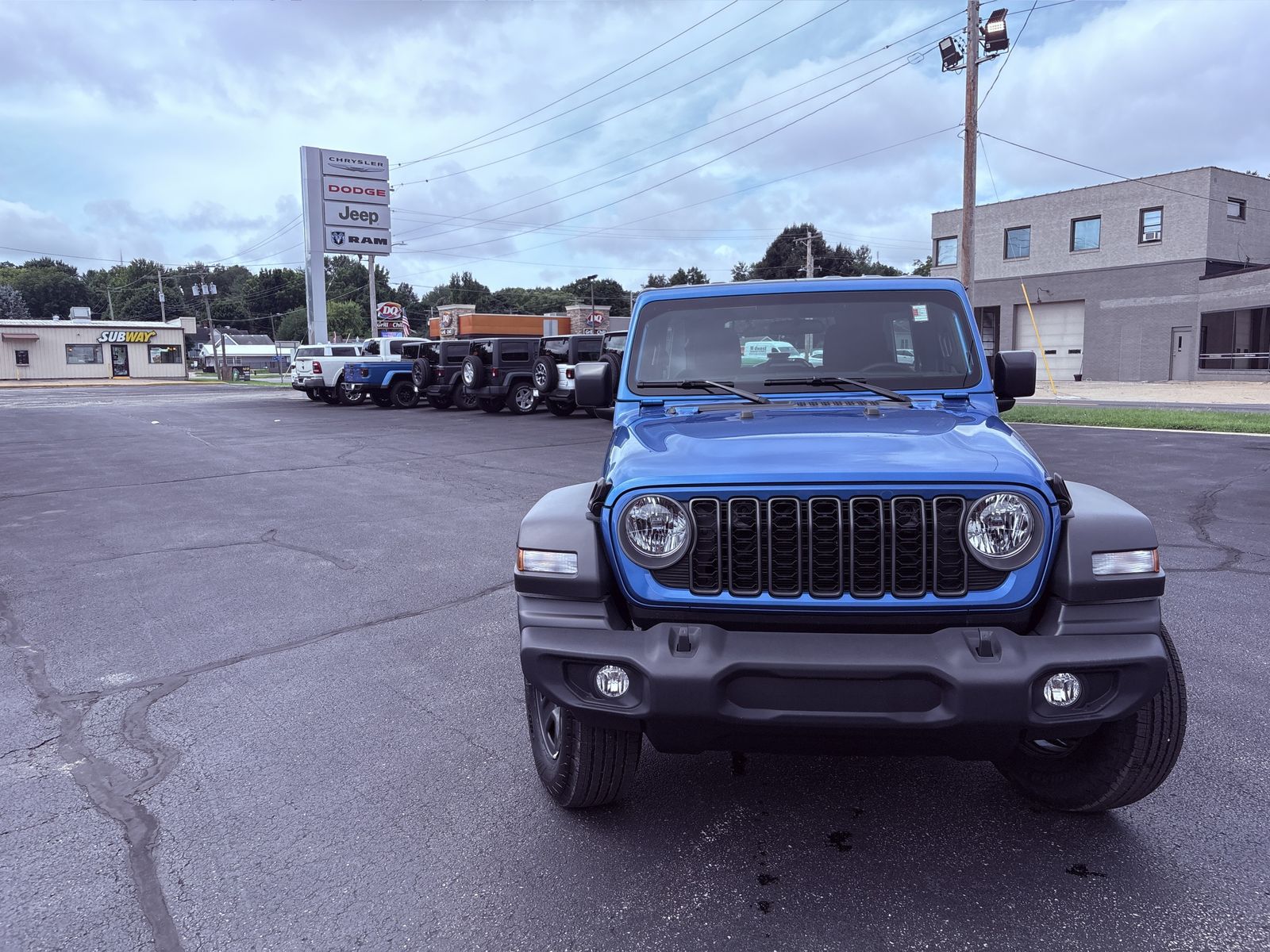 2025 Jeep Wrangler Sport photo 2
