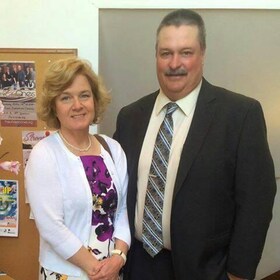 Staff member Nancy and Kevin Thomas  from ID_820969