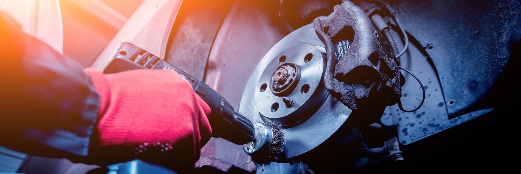 Mechanic cleaning brake rotors
