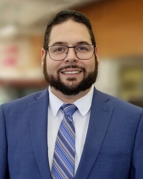 Staff member Brian Augusto from ID_787ace007026