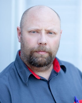 Staff member Charlie Clark from 7f5c745ae742