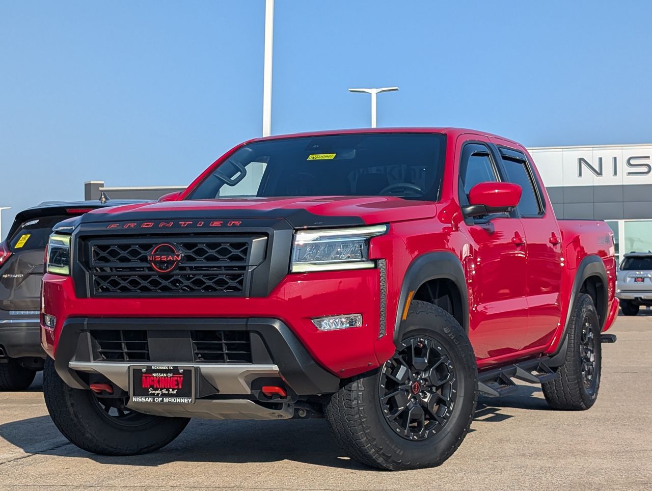 Red Alert 2023 Nissan Frontier Pickup Truck Four-Wheel Drive Automatic