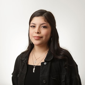 Staff member Sasha Martinez from ID_0f757bd8d679