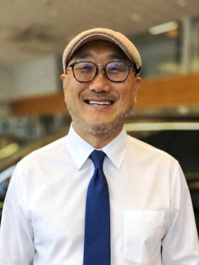 Staff member TOM KIM from ID_648fab9e40a9