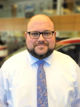 Staff member COREY HARPER from ID_0bf100600855