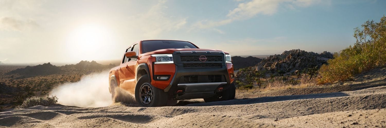 Nissan Frontier Pro-X Crew Cab Driving in the Sand