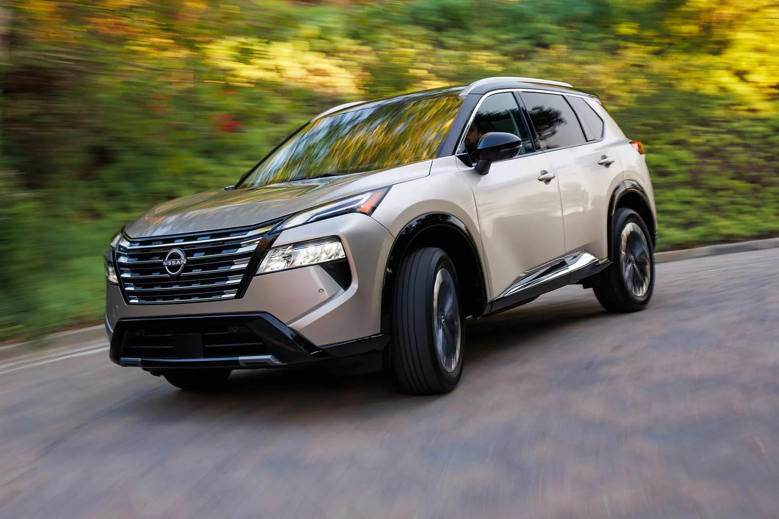 The 2026 Nissan Rogue driving on an open road