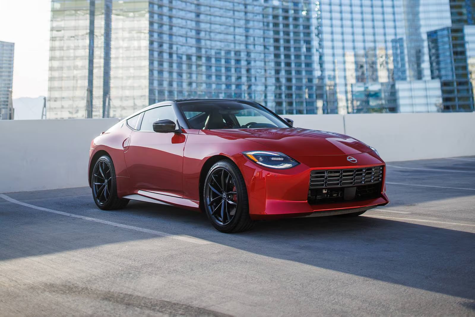 The2026 Nissan Z Parked on the roof of a parking garage in the city