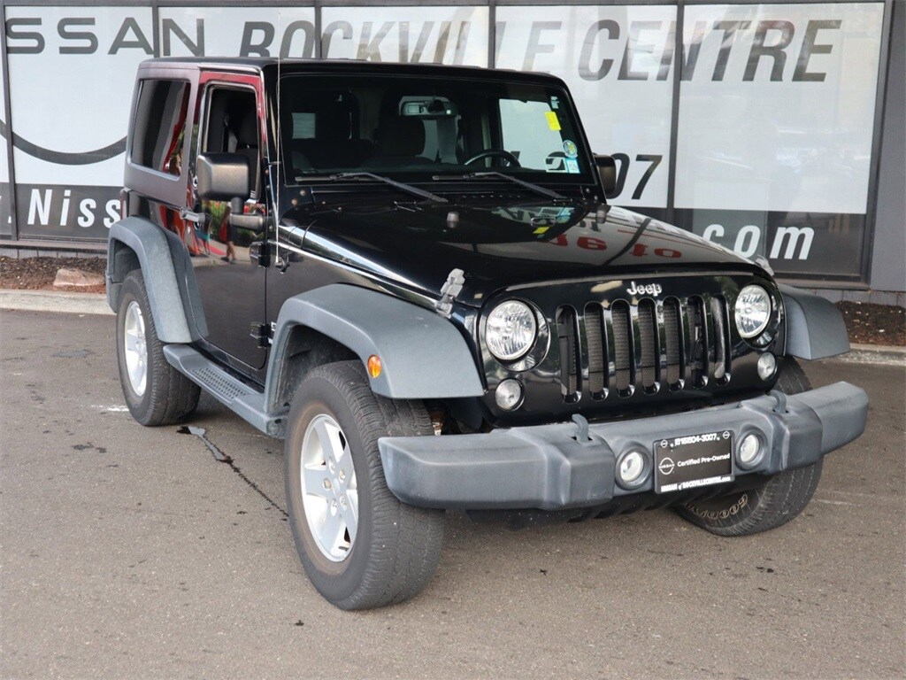 Used 2015 Jeep Wrangler Sport with VIN 1C4AJWAG2FL648947 for sale in Rockville Centre, NY