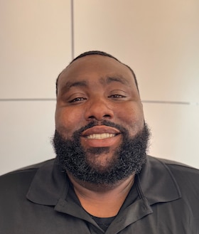 Staff member OJ Johnson from ID_8ba8be999b77
