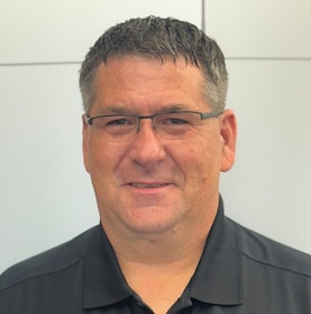 Staff member David Reece from ID_8ba8be999b77