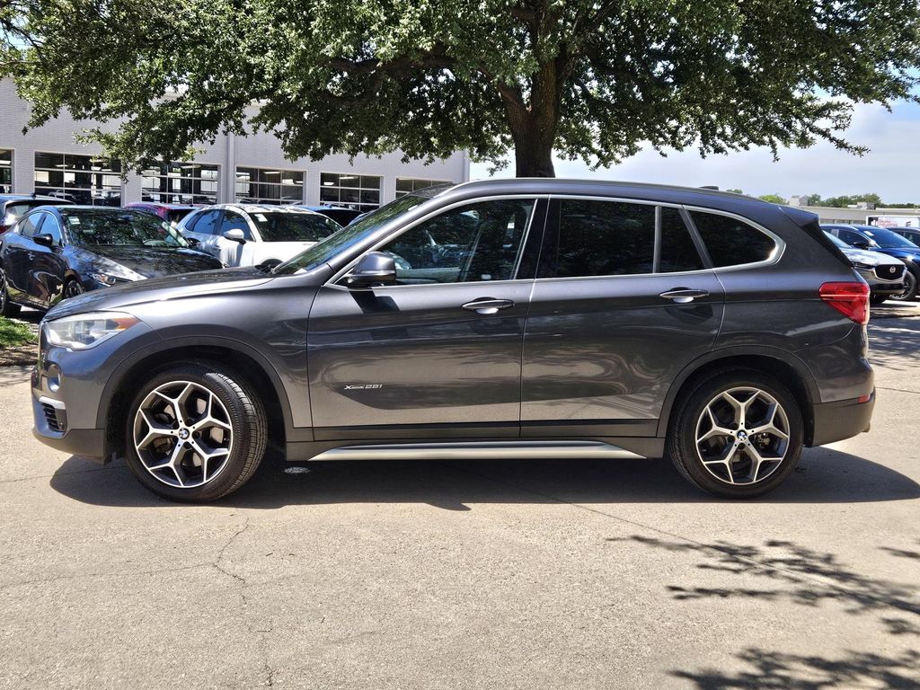 Used 2017 BMW X1 28i with VIN WBXHT3Z3XH4A58099 for sale in Irving, TX