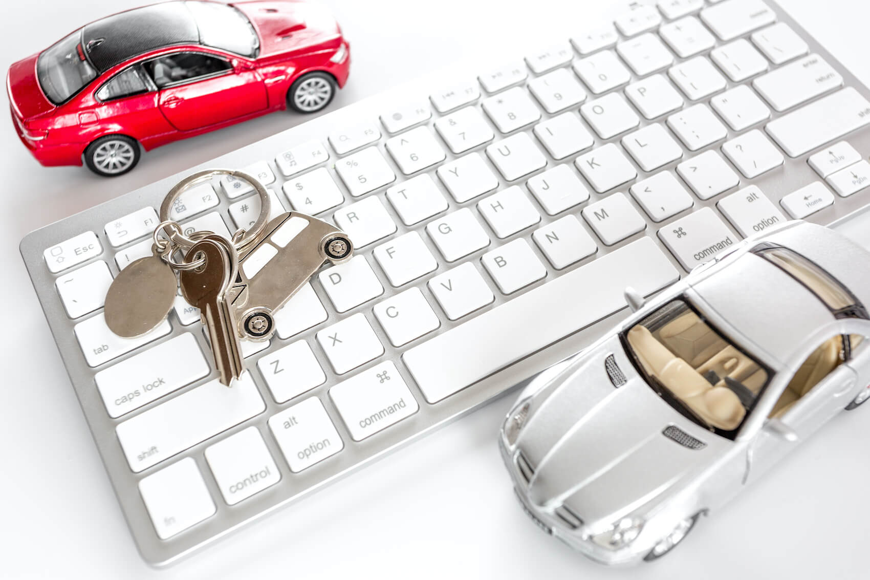 Car keys on top of a keyboard