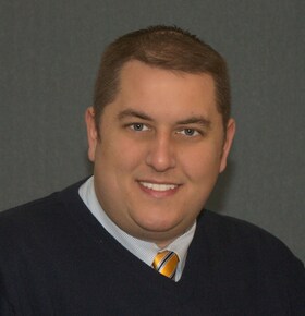 Staff member Scott Sarat from ID_149c7a26e4ac
