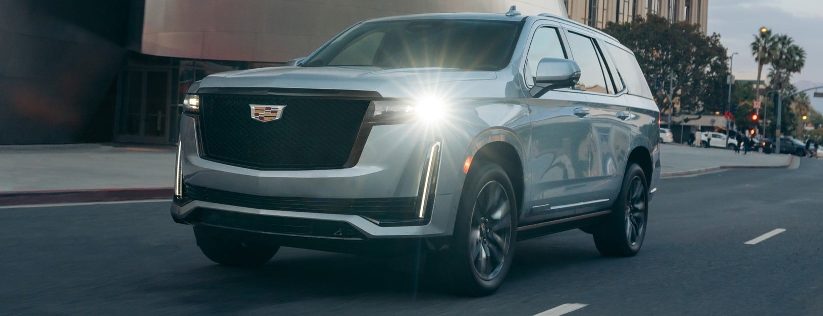 Cadillac Escalade driving through the city, front view - Cadillac Dealer near Escondido CA